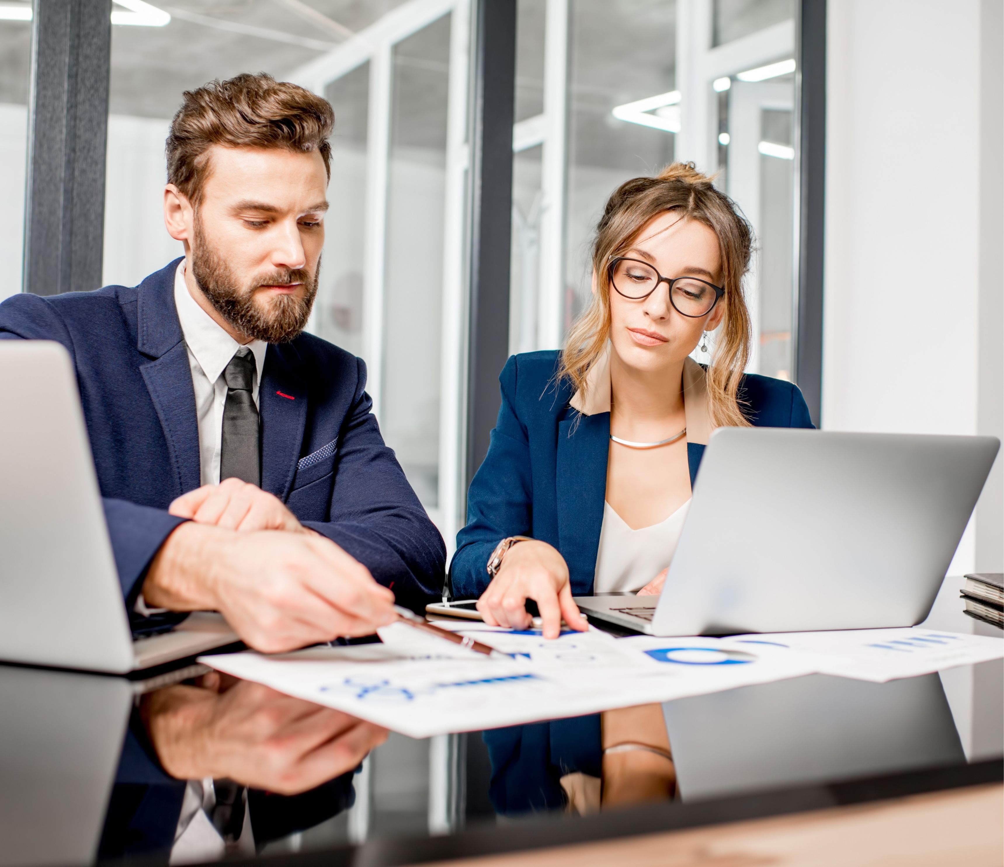 Finance professionals reviewing integration approach